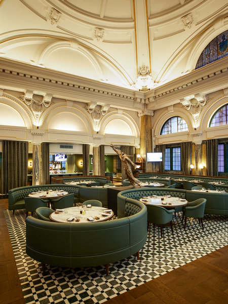 Forget the formality of city slicker suits, Manchester’s new five-star Stock Exchange Hotel is serving Premier League food