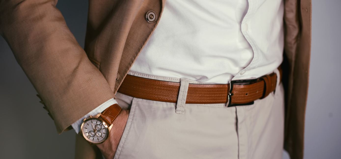Italians are the most stylish but Victoria Beckham dresses best - man's watch and belt.