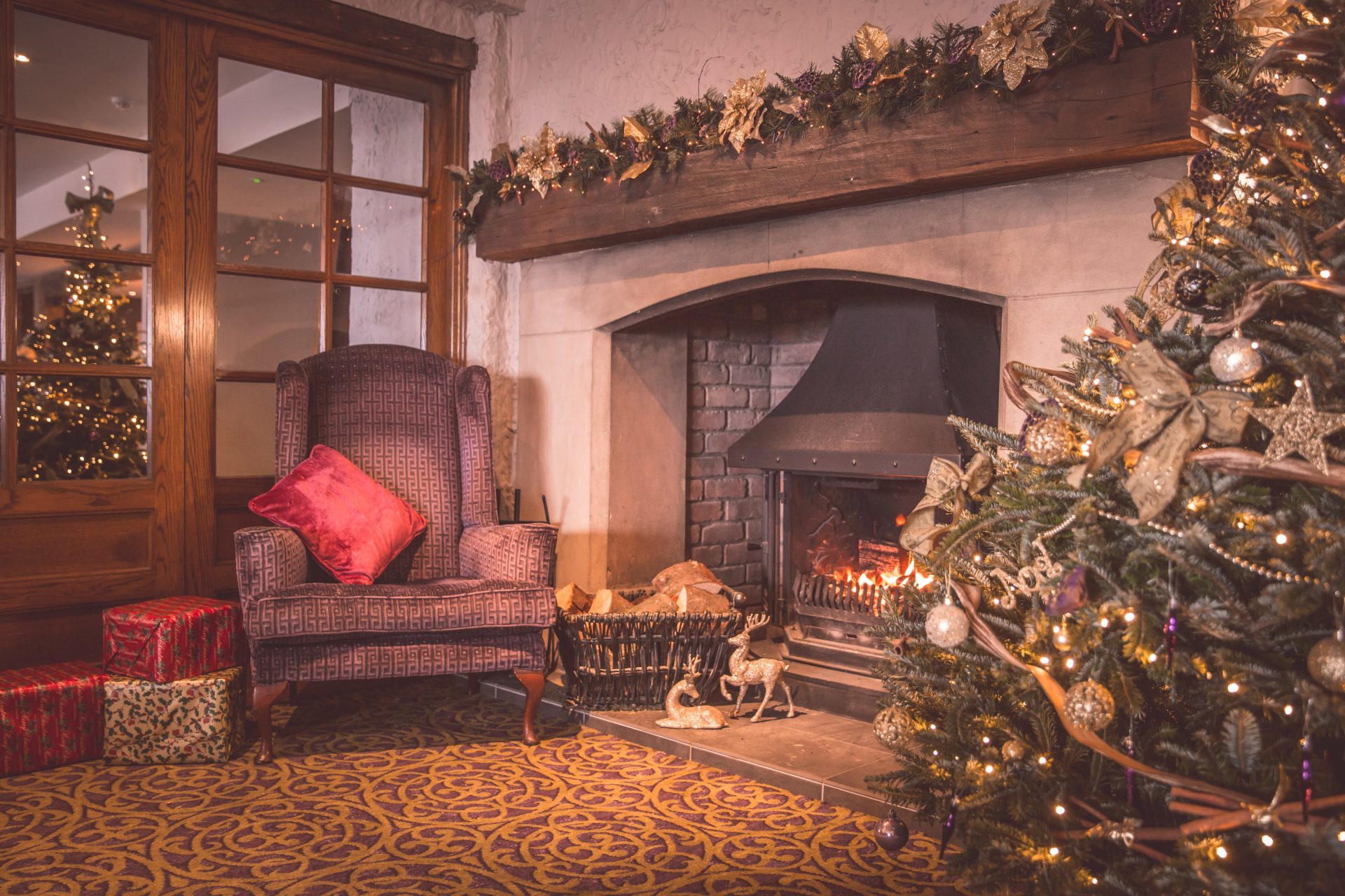 Scenic Christmas scene in front of fire place